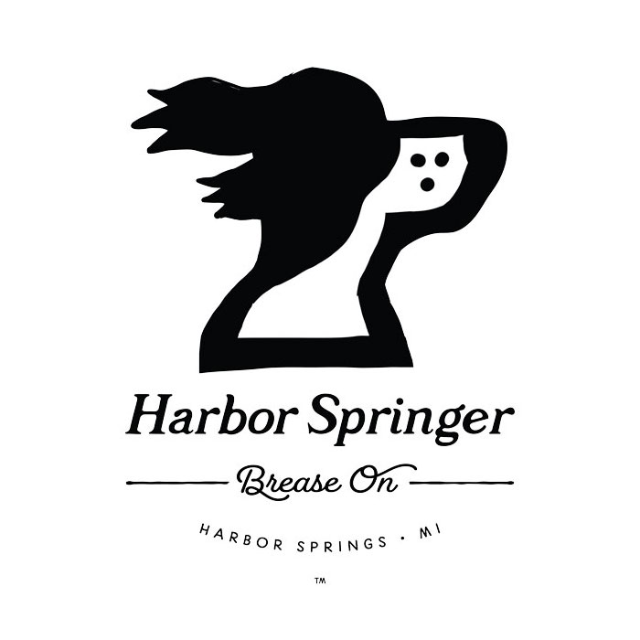 Michigan brand logo showing a dog with ears flapping for the Harbor Springer brand celebrating Harbor Springs Michigan.